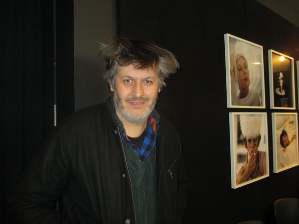 Christophe Honoré with photographs of Federico Fellini's 81/2 star, Sandra Milo 